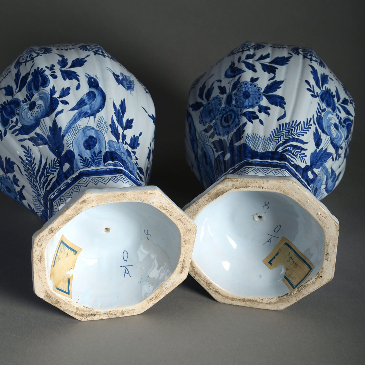A pair of 19th century blue and white delft vases
