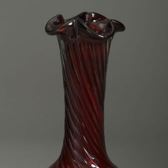 Early 20th century red swirl glass vase