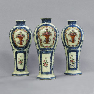 A set of three famille rose vases