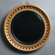 Round: 19th century regency period giltwood convex mirror