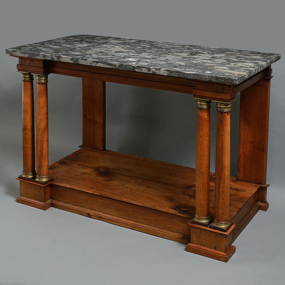 An early 19th century empire period walnut console table