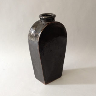 A black glazed Chinese pottery bottle, c 1860