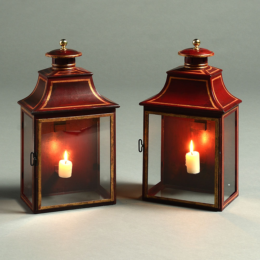 A pair of 20th century red tole hall lanterns