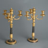 A pair of early 19th century charles x ormolu and bronze candelabra