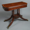 A 19th century regency period mahogany tea table