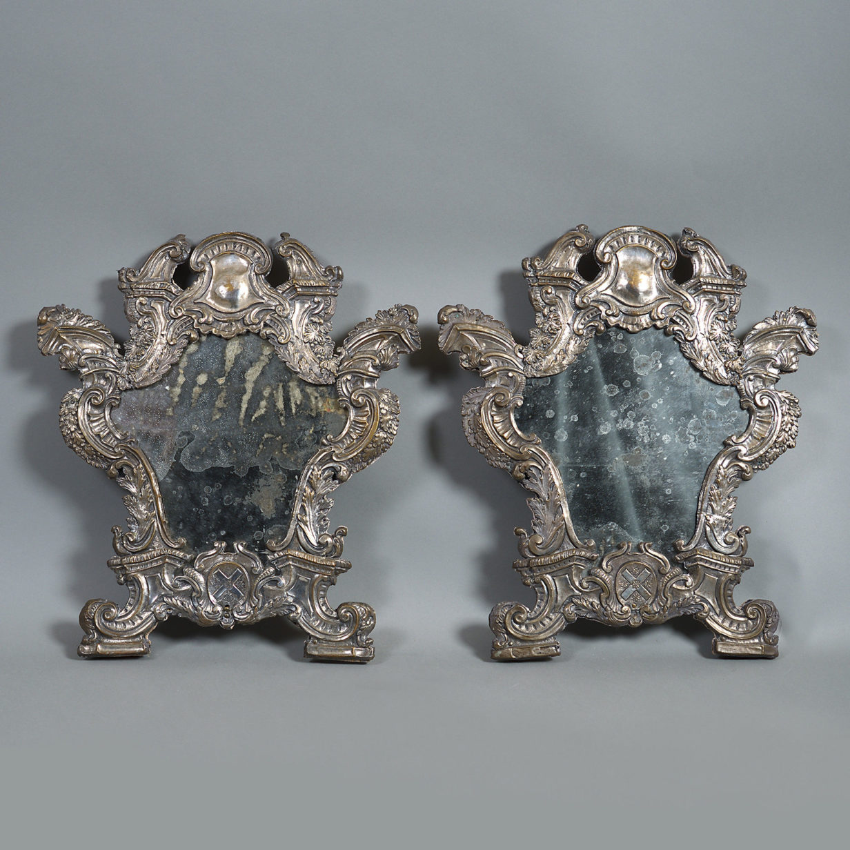 A rare 18th century pair of silvered wall mirrors