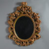 20th century baroque style oval mirror