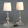 Early 20th century pair of silvered table lamps