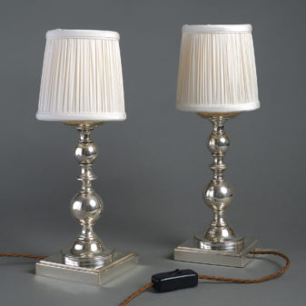 Early 20th century pair of silvered table lamps