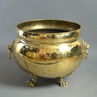 A large 19th century brass planter or wine cooler