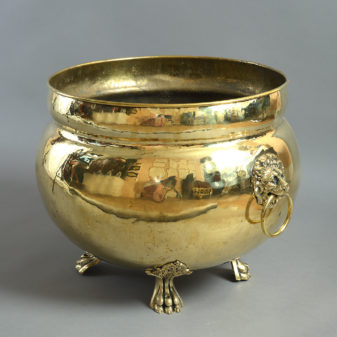 A large 19th century brass planter or wine cooler