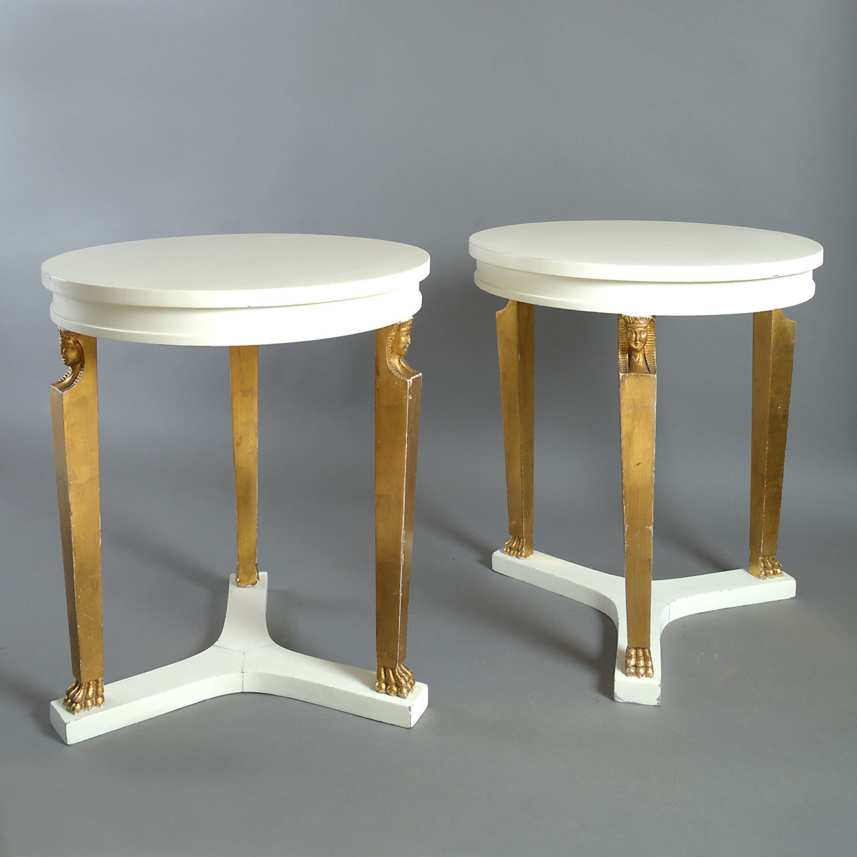 Mid-20th century pair of neo-classical circular end tables