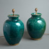 A pair of green glazed bulbous vases as lamps