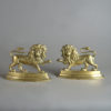 19th century pair of brass lion doorstops