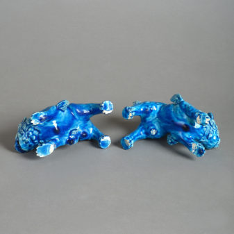 Pair of 19th century turquoise porcelain dogs of fo
