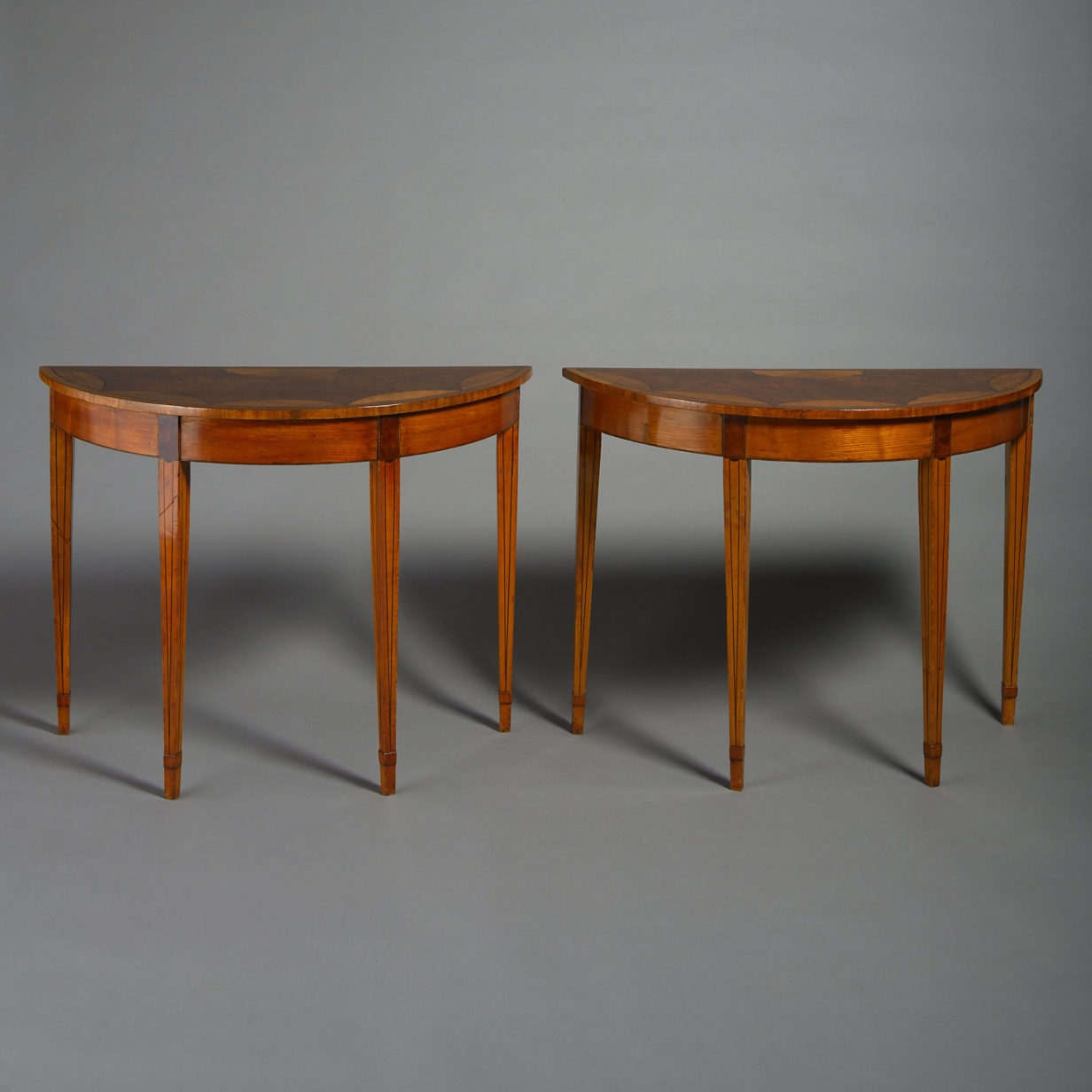Pair of 19th century demi-lune console tables