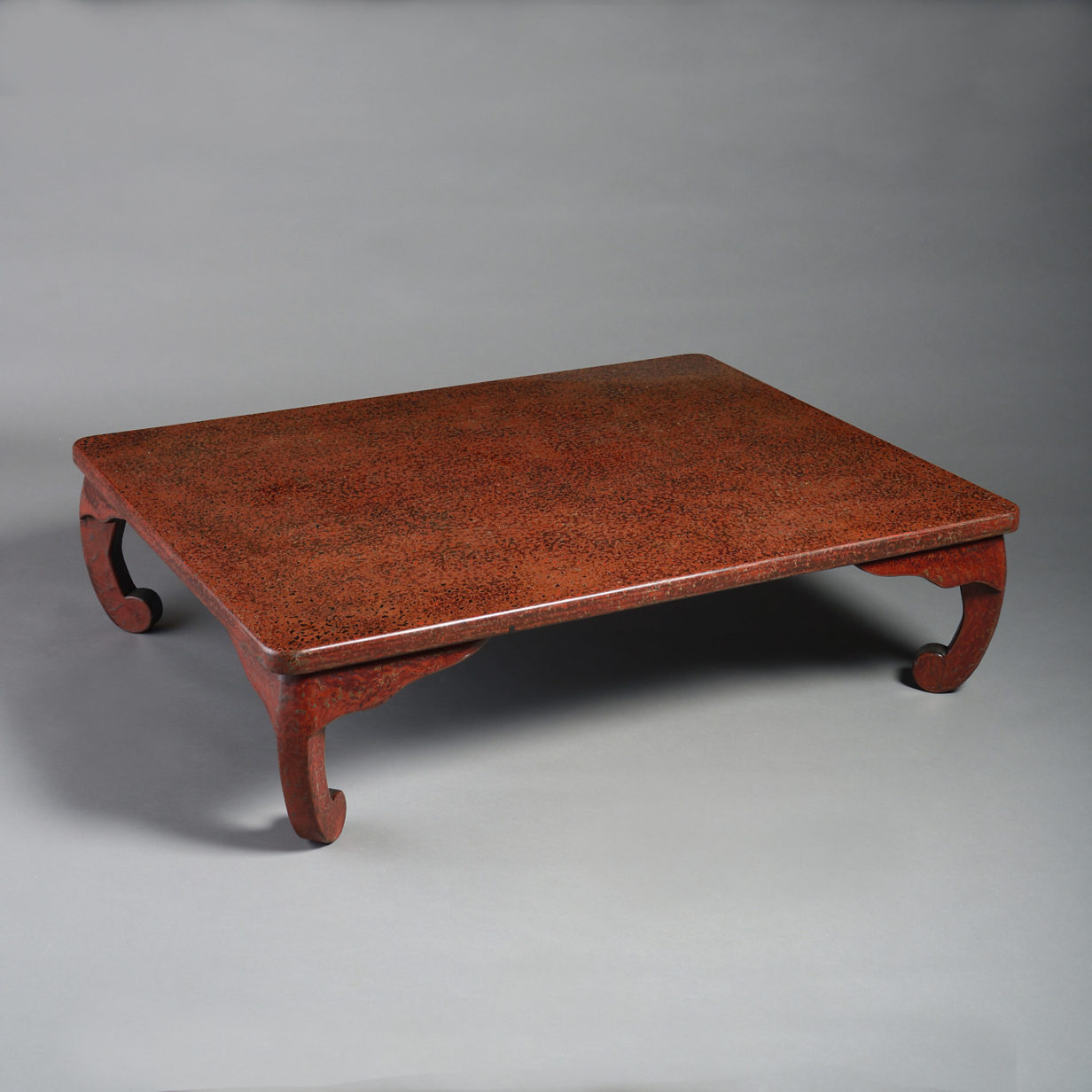 A 20th century wakasa-nuri red lacquer low or coffee table
