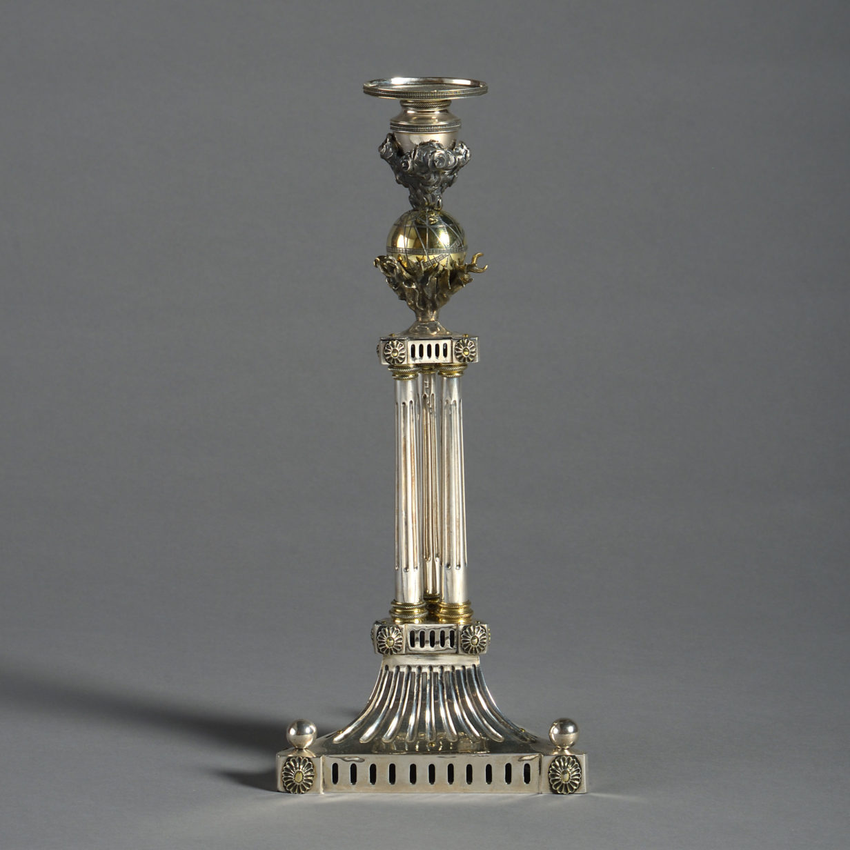 Early 19th century pair of silver & ormolu candlesticks