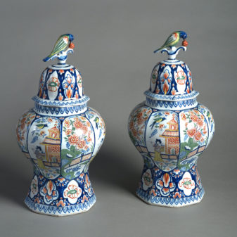 Early 20th century pair of delft vases & covers