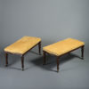 Mid-19th century pair of upholstered long stools