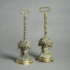 A 19th century pair of brass doorstops