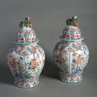 Late 19th century pair of faience pottery vases