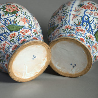 Late 19th century pair of faience pottery vases