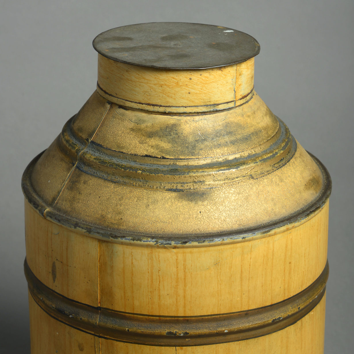 An early 20th century tole tea canister