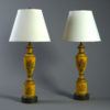 A large pair of tole lamp bases