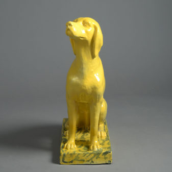 Lifesize bright yellow ceramic statue of a pointer dog