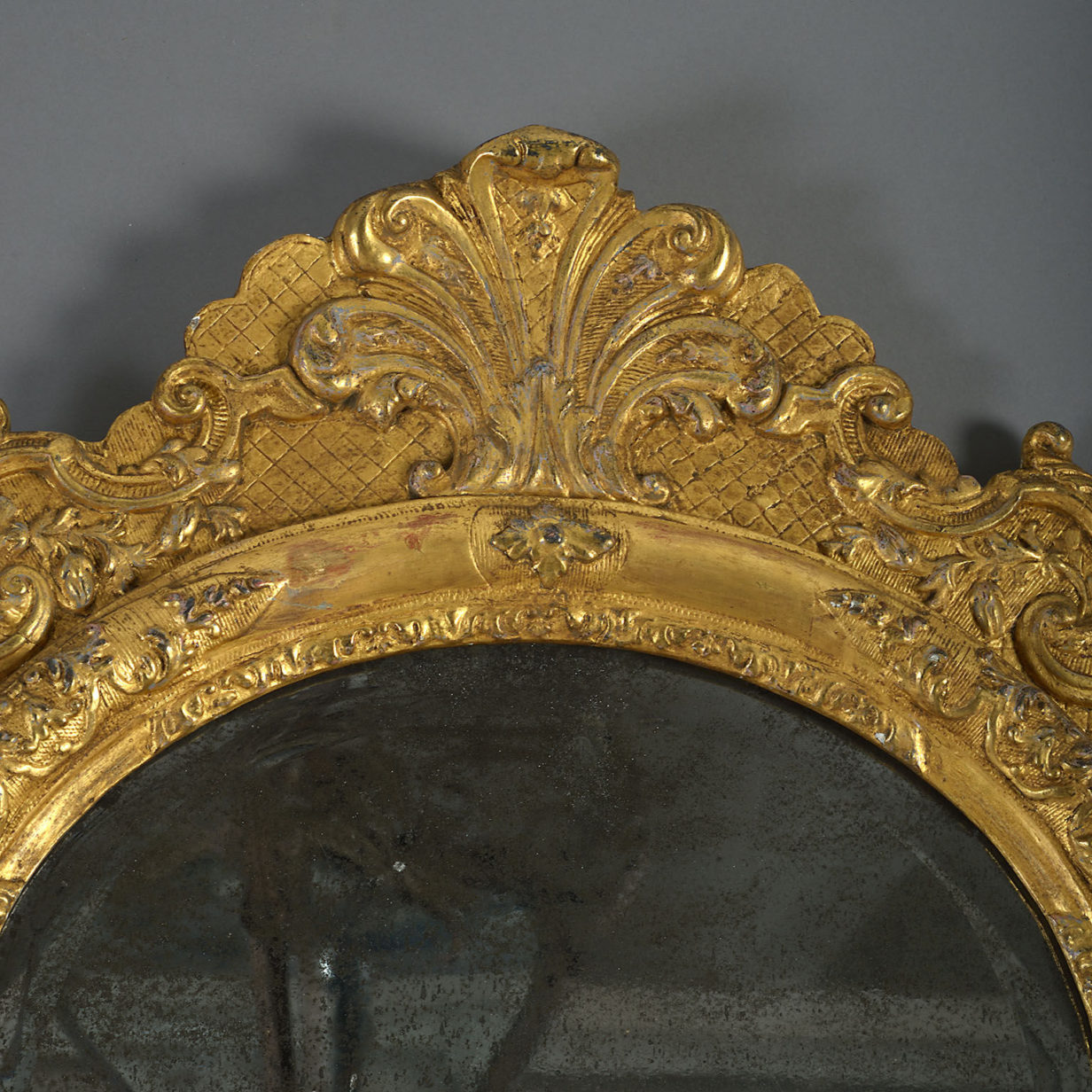 Early 18th century baroque giltwood mirror