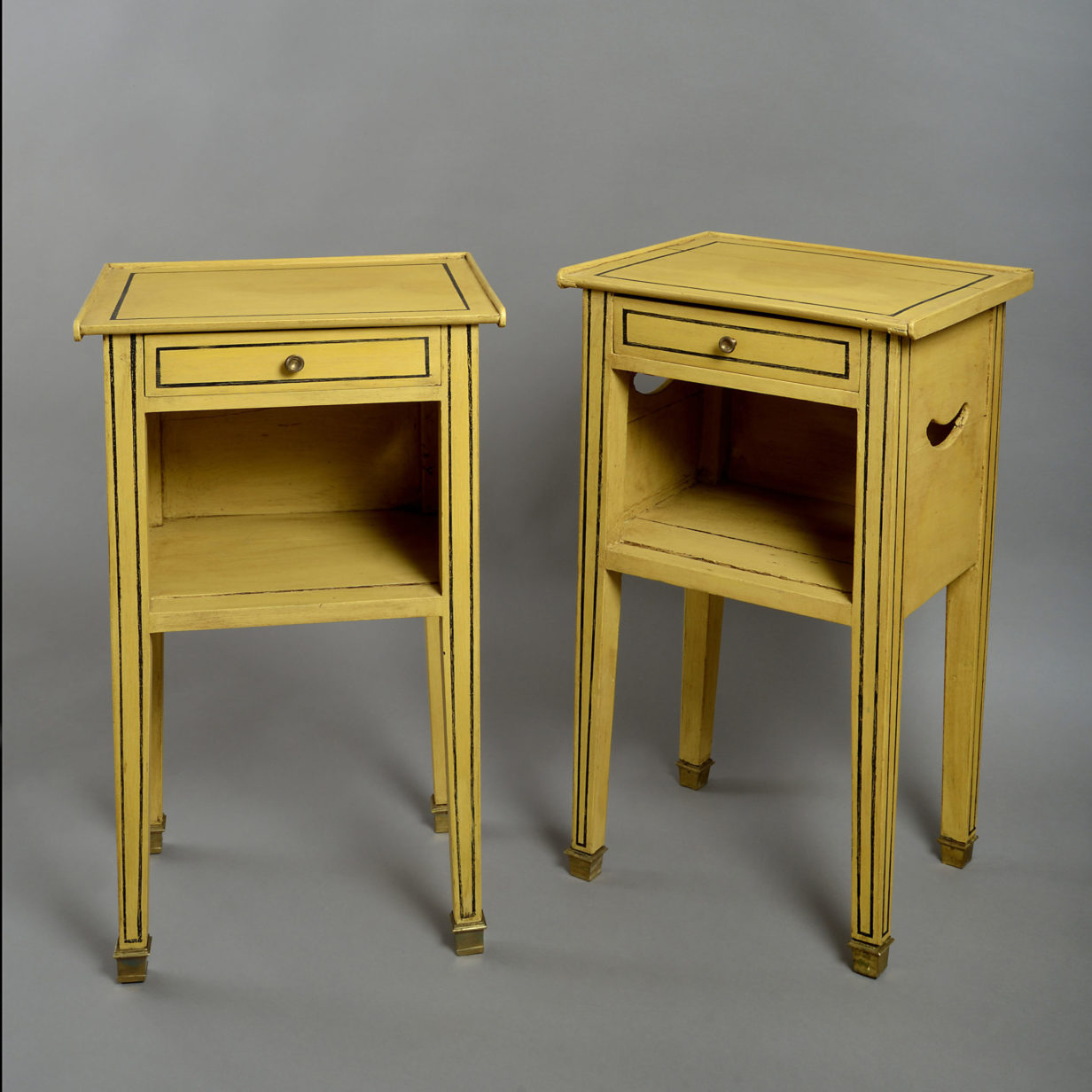 A pair of 19th century painted bedside tables