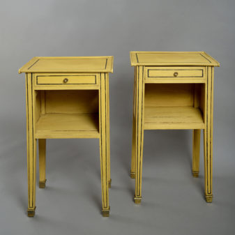 A pair of 19th century painted bedside tables