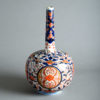 A 19th century imari porcelain bottle vase
