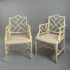 A mid-20th century pair of painted chinoiserie cockpen armchairs