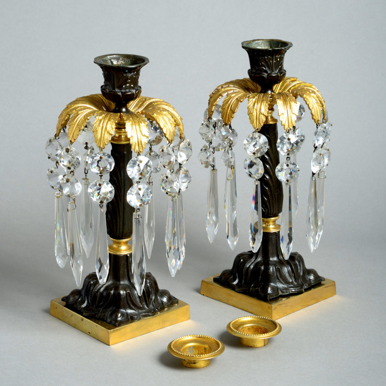 A pair of early 19th century regency ormolu table lustres