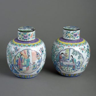 A pair of canton enamel vases & covers