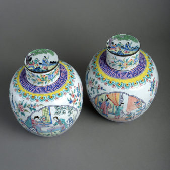 A pair of canton enamel vases & covers