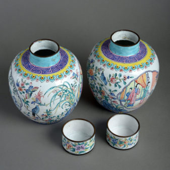 A pair of canton enamel vases & covers