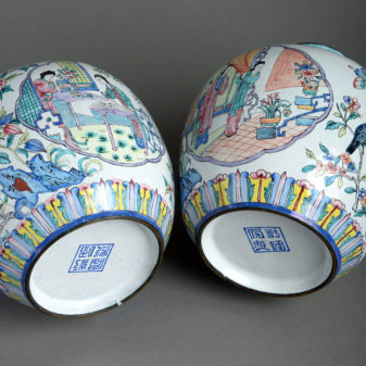 A pair of canton enamel vases & covers