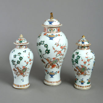 A garniture of three 19th century samson vases & covers