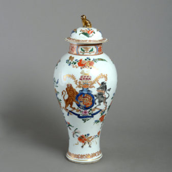 A garniture of three 19th century samson vases & covers