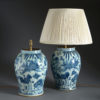 A large pair of blue & white vase lamps
