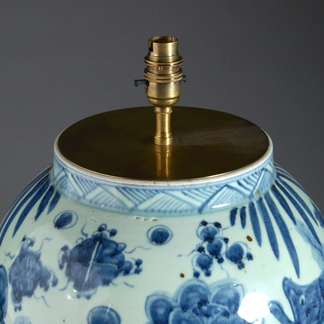 A large pair of blue & white vase lamps