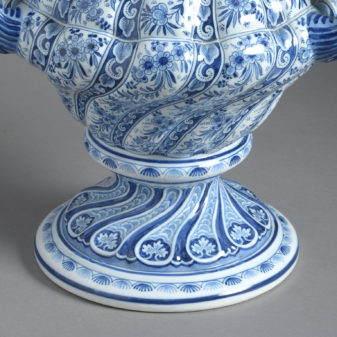 A large pair of rococo revival delft lidded vases