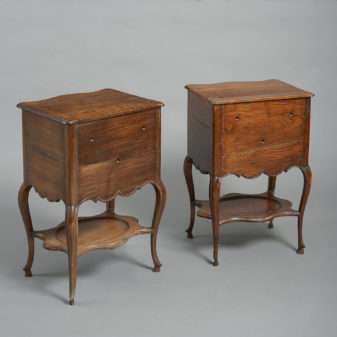 A pair of 18th century walnut and chestnut bedside tables