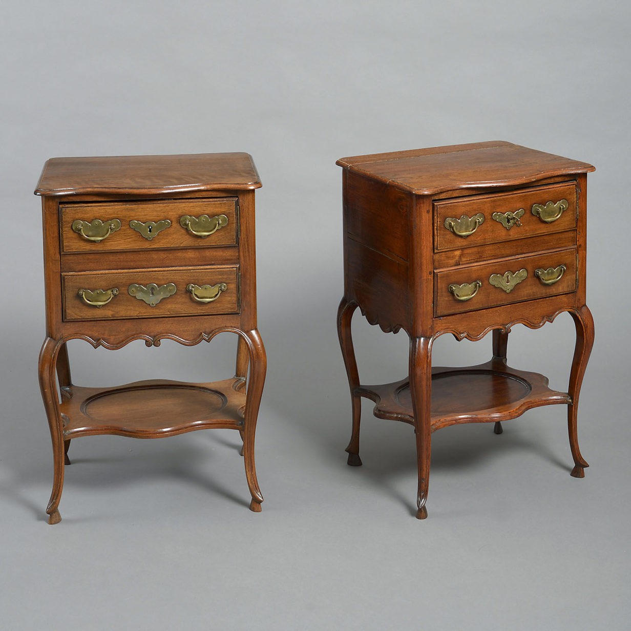 A pair of 18th century walnut and chestnut bedside tables