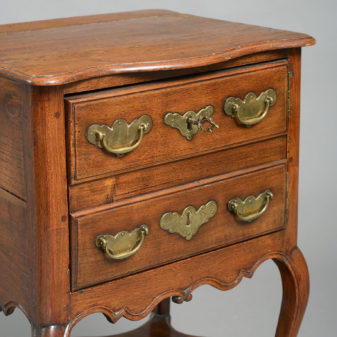 A pair of 18th century walnut and chestnut bedside tables