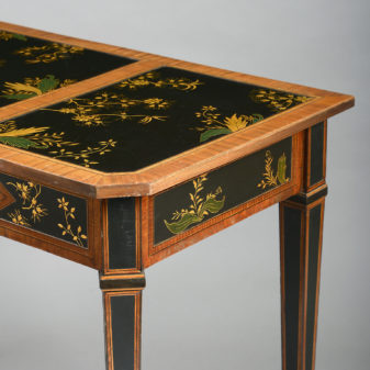 An 18th century satinwood side table inset with lacquer panels