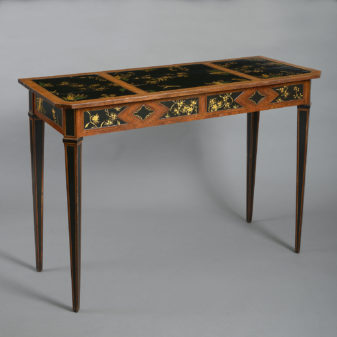 An 18th century satinwood side table inset with lacquer panels